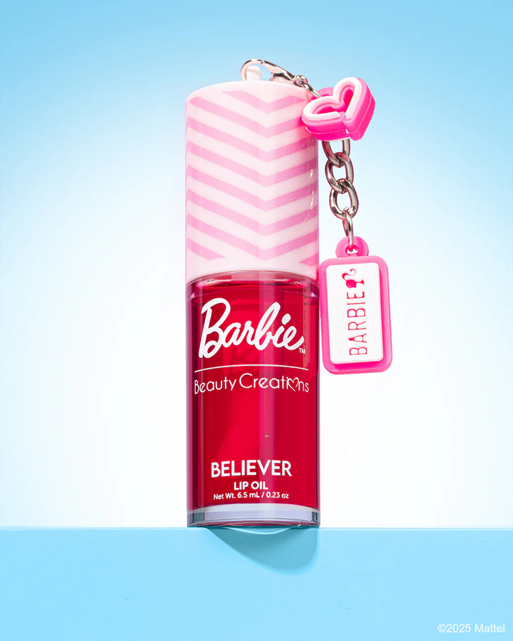“Shimmer Lip Oil” - Barbie X Beauty Creations