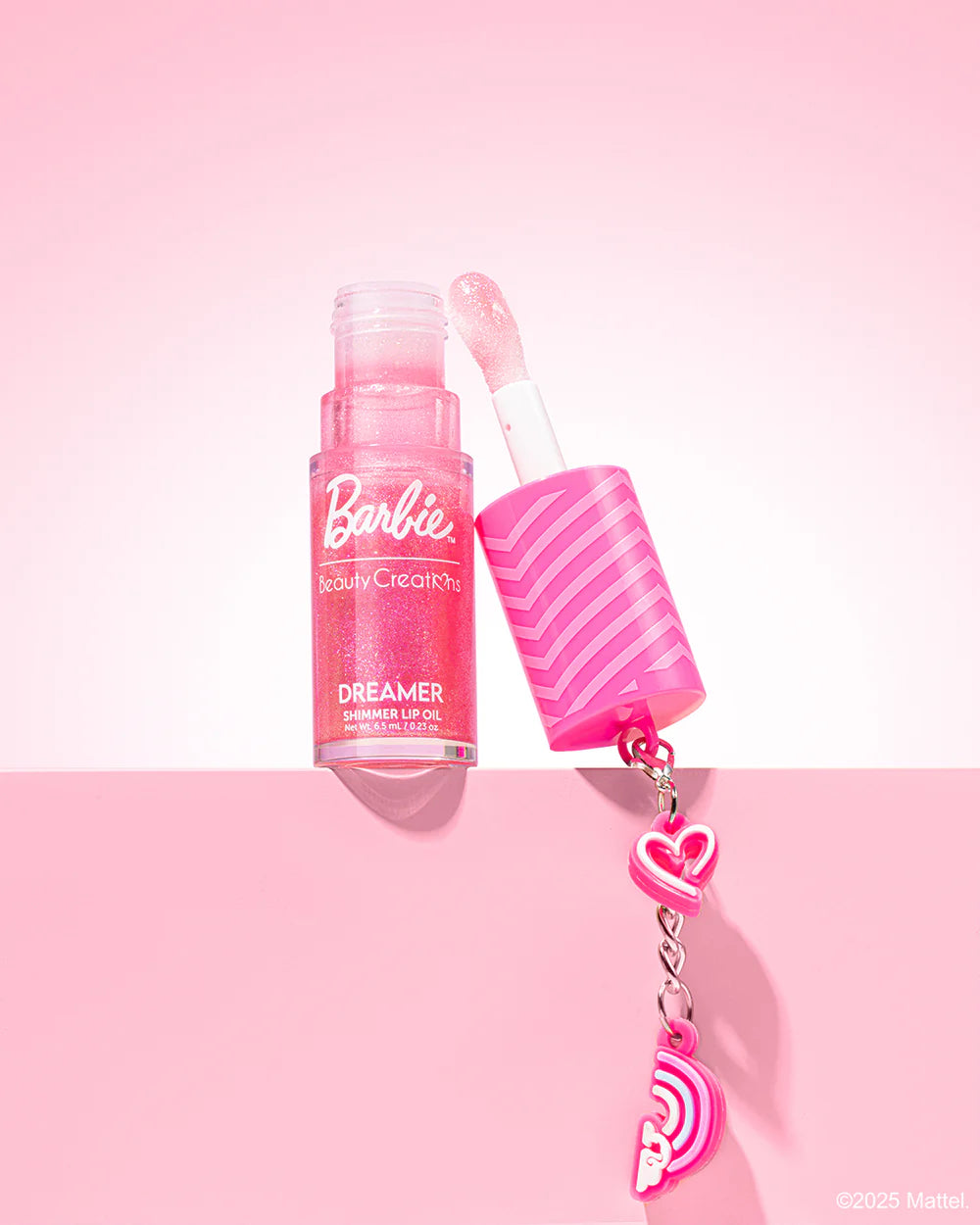 “Shimmer Lip Oil” - Barbie X Beauty Creations